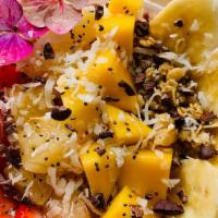 La Luna Bowl · Strawberries, mango, pineapple, banana, cacoa nibs, coconut flakes, chia seeds, with honey d...