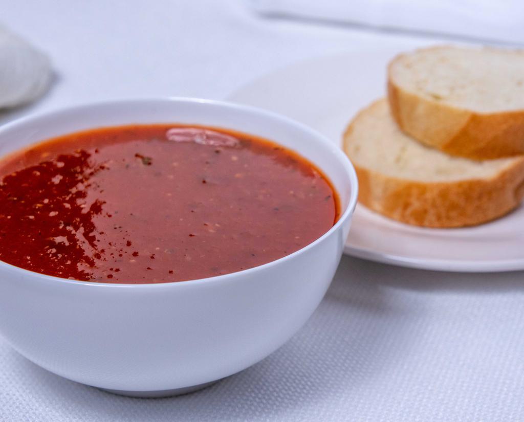 Tomato Basil · Vegetarian, gluten-free, vegan. Tomato soup with basil, onions, and herbs.
