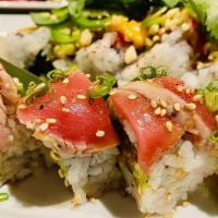 Red Dragon Roll (8Pcs) · Inside – Spicy Tuna | Cucumber | Avocado
Outside – Seared Tuna | Ginger sauce | Scallions.

...
