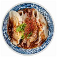 Steamed Gyoza 4 Pc · buta gyoza, steamed and served in a spicy sauce, with green onion, fried garlic, sesame, chi...