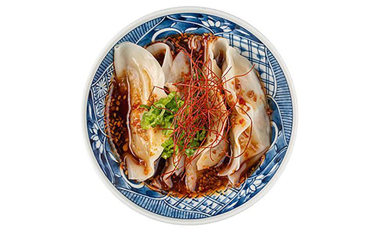 Steamed Gyoza 4 Pc · buta gyoza, steamed and served in a spicy sauce, with green onion, fried garlic, sesame, chile.