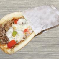 Philly Steak Pita · Original steak and provolone cheese, grilled onions and peppers on a pita.