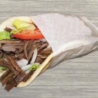 Steak Pita · Marinated tender beef shawarma with lettuce, onions, tomatoes and Tzatziki Sauce in a Pita.