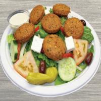 Falafel Salad · Greek Salad with Falafels and Tahini Sauce. (Vegetarian)