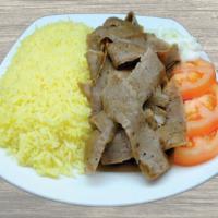 Gyros Plate · Seared layers of select beef and lamb perfectly seasoned with zesty spices, broiled on a ver...