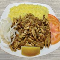 Chicken Shawarma Plate · Marinated dark and white chicken served with rice, pita bread, tomatoes, onions and Tzatziki...