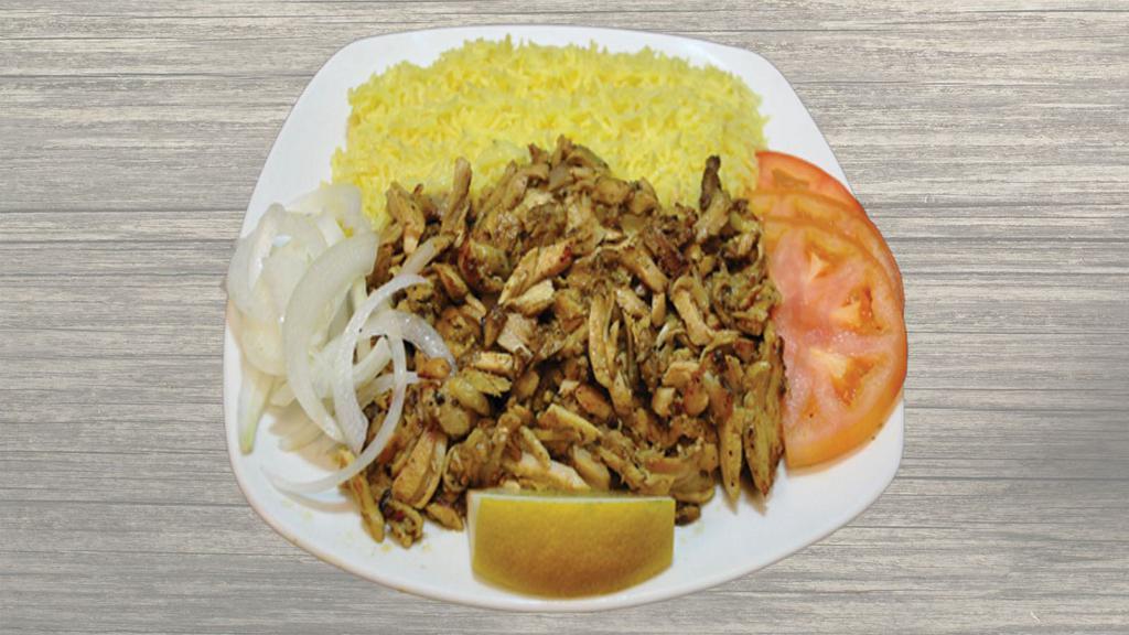 Chicken Shawarma Plate · Marinated dark and white chicken served with rice, pita bread, tomatoes, onions and Tzatziki sauce.