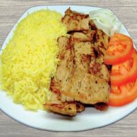 Chicken Gyros Plate · Seared layers of seasoned chicken, boiled on a vertical skewer, thinly sliced, served with R...