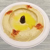 Classic Hummus + 2 Pitas · Hummus is our house blended chickpeas, tahini, olive oil, fresh garlic and lemon juice.  Ser...