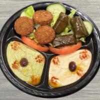 Vegetarian Plate · A combination of original hummus, Baba-Ghanouj, three Dolmas, three Falafels, Tahini, Tzatzi...