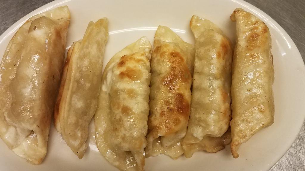 Potstickers · Six pieces. Pan fried chicken or pork dumpling. Served with special sauce.