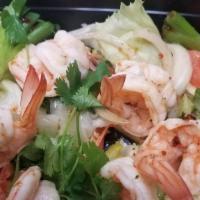 Shrimp Salad (Yum Goong) · Calamari mixed with red onion, scallion, chili powder, lime juice, lettuce, tomatoes, lemong...