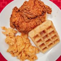 Chicken And Waffle Sandwich · Served with a side of Mac & Cheese, Syrup