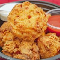 Mac & Cheese Balls · Our Mac & Cheese rolled into a ball, coated in a crispy batter and deep-fried to a golden fi...