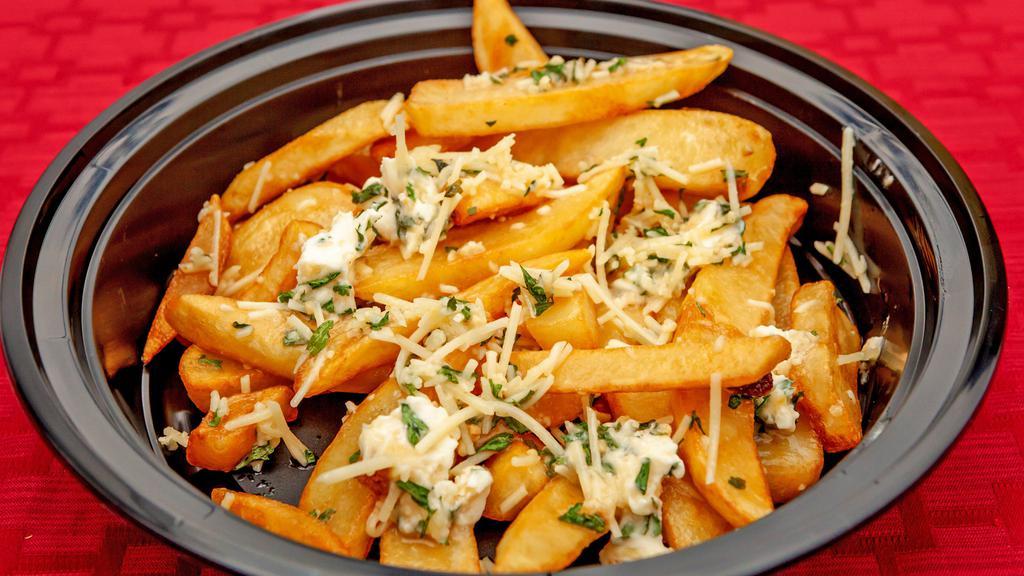 Garlic Parmesan Fries · Thick cut and fried to perfection with garlic Parmesan butter and shredded Parmesan cheese.