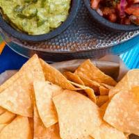 Chips & Guacamole With Salsa Fresca · House made corn chips, salsa fresca and guacamole.