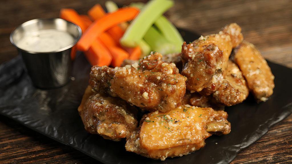Garlic Parmesan · 8 garlic parmesan wings (mild heat), served with carrots & celery and a choice of blue cheese, classic ranch, or Sriracha ranch for dipping