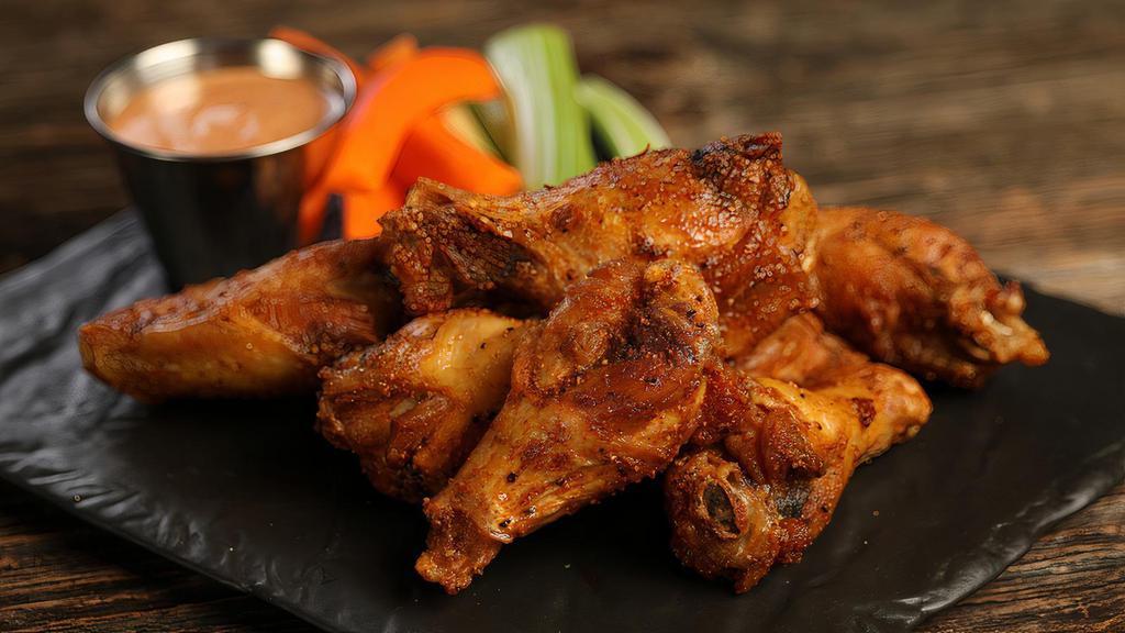 Cajun · 8 Cajun dry rub wings (mild heat), served with carrots & celery and a choice of blue cheese, classic ranch, or Sriracha ranch for dipping