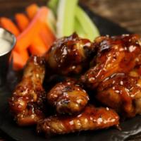 Teriyaki · 8 teriyaki smoked and grilled wings (mild heat), served with carrots & celery and a choice o...