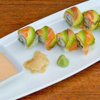 Rainbow Roll · Crabmeat, cucumber, avocado inside, topped with 4pc fish.
