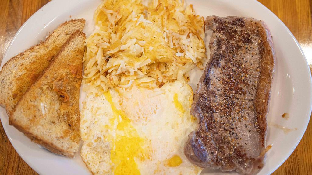 Western New York Steak · Served with three eggs, hash browns & toast.