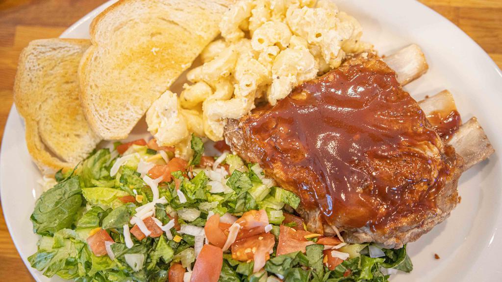 Bbq Ribs · Served with your choice of salad, fries or Mac & Cheese and Garlic Toast.