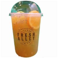 Peach Crush · Peach citrus fruit green tea with fresh fruit bits and chia seeds.