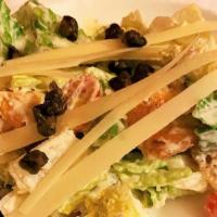 Insalata Cesare · Romaine lettuce, home-made moutons, cherry tomatoes, shaved parmesan cheese, and home-made c...