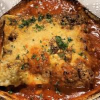 Lasagna Bolognese · Housemade lasagna with meat sauce, bechamel sauce and parmesan cheese