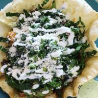 Taco Salad · Flour Tortilla Bowl Green, Tomatoes, Rice, Black Beans, Guacamole, Cheese and Crema with Shr...