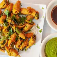 Cut Mirchi · A popular Indian street food made by frying battered green chilies.