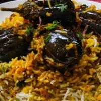 Gutti Vankaya Biryani · A perfect blend of traditional South Indian eggplant masala and aromatic basmati rice cooked...