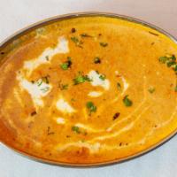 Chicken Tikka Masala · Aromatic grilled chicken served with spiced curry.