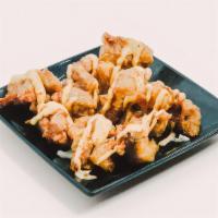 Chicken Karaage · Lightly battered dark meat chicken with spicy aioli sauce