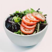 House Salad · Spring mix,  tomato, and ginger dressing
