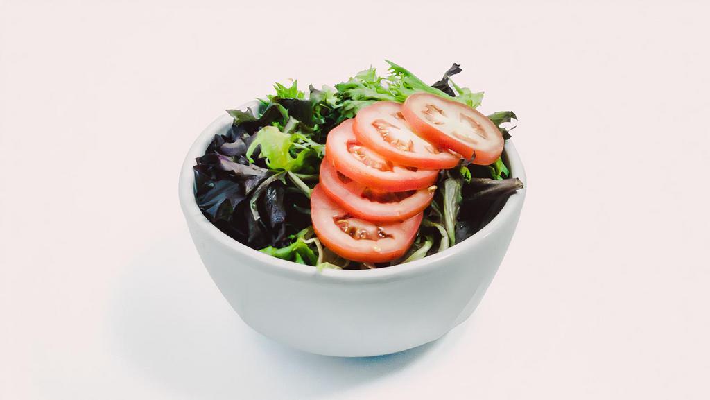 House Salad · Spring mix,  tomato, and ginger dressing
