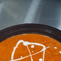 Paneer Tikka Masala · Indian cheese simmered in rich tomato gravy.