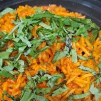Vegetable Biryani · Seasoned vegetables, aromatic rice pilaf served with vegetable raita.