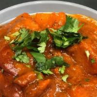 Chicken Vindaloo · Chicken cooked with potatoes and a special spicy sauce.