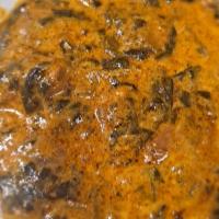 Lamb Saag · Lamb cooked with spinach in seasoned herbs and spices.