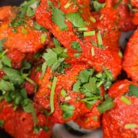Chicken Tikka Kabob · Boneless chicken pieces marinated and cooked in our tandoori oven.