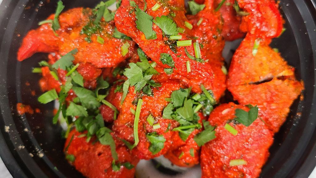 Chicken Tikka Kabob · Boneless chicken pieces marinated and cooked in our tandoori oven.