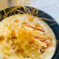 Kheer · Indian style rice pudding with sweet milk, cardamon, nuts.