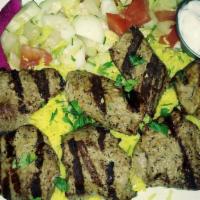 Kofta Kebab · Seasoned ground beef and lamb mixed with chopped parsley, onions char-broiled and served ove...