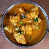 Chicken Curry · Gluten-free, Dairy-free, Nut-free. Chicken sautéed in our traditional curry sauce.