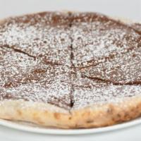 Nutella Pizze · Pizza crust with nutella and powdered sugar.