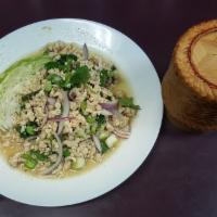 Larb Salad · Ground meat chicken or pork mixed with lime juice, a touch of ground roasted rice, and red a...
