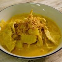 Yellow Curry · Yellow curry paste with coconut milk, potato, and onion.
