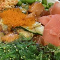 Torched Mentaiko Salmon Bowl · Torched salmon served over furikake rice, sea salt, mentaiko sauce, scallions, tamago, ginge...