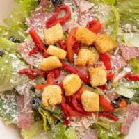 Trackside Chop Salad · Romaine, myzithra, canadian bacon, salami, black olives, red onion, roasted red pepper and c...